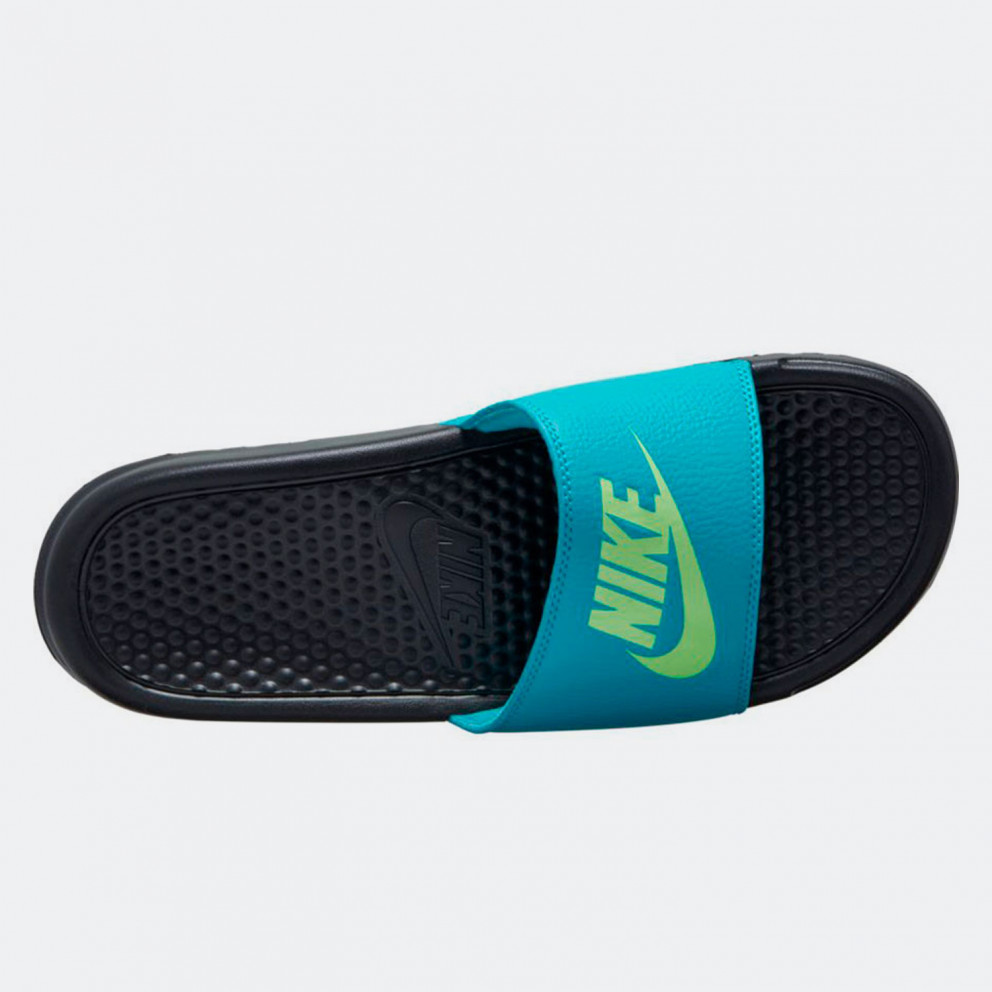 blue and green nike slides